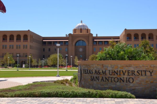 Grand entrance sign in brick spelling "Texas A&M University San Antonio"