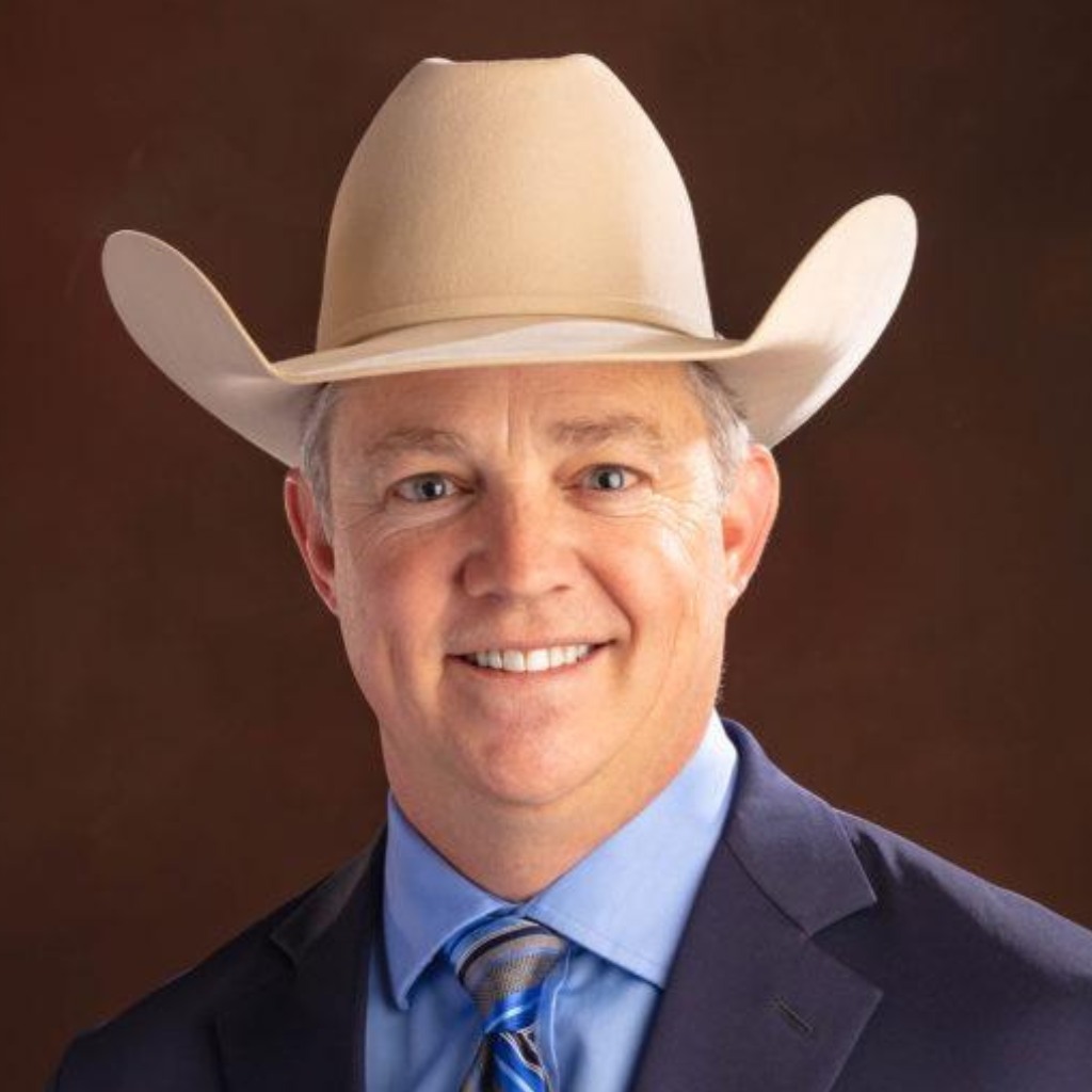 Man in cowboy hat portrait smiling